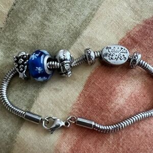Silver Charm Bracelet with Blue Bead